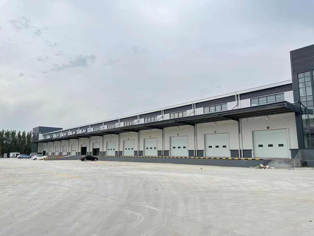 China Geprefabriceerd gebouw / staalproductie / geprefabriceerde metalen werkplaats / lage prijs / aangepaste staalconstructie